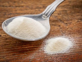 Powdered collagen in a spoon