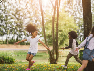 African american little girls playing outdoors