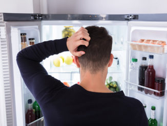 Man looking in Refrigerator